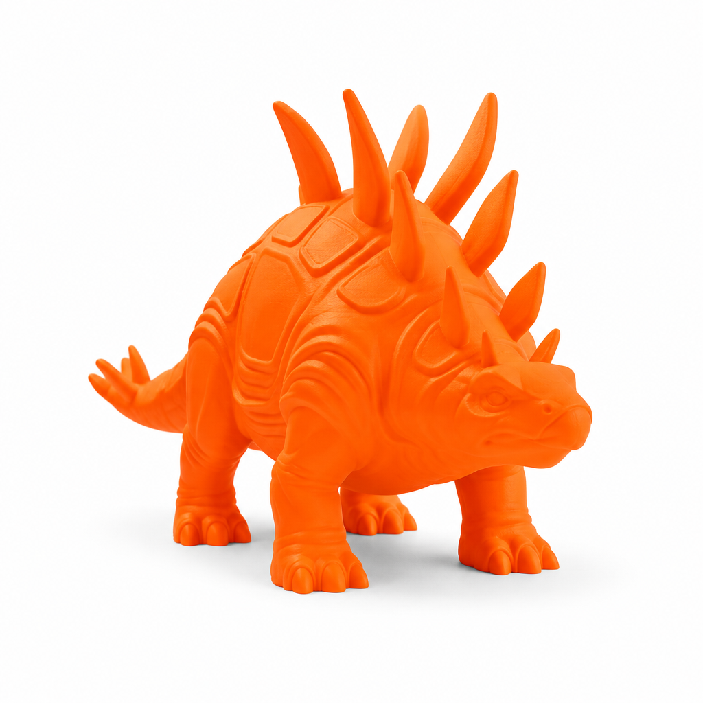 Fluorescent orange spiky stegosaurus toy on white background