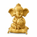Golden Ganesha figurine on white background