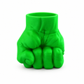Green fist pen holder on a white background
