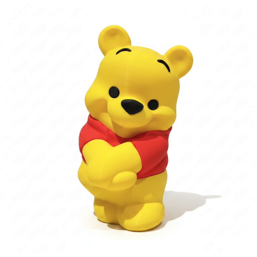 Honey Bear Buddy 3D-printed yellow bear figurine, white background