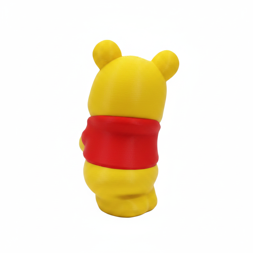 Honey Bear Buddy 3D-printed yellow bear figurine back view, white background