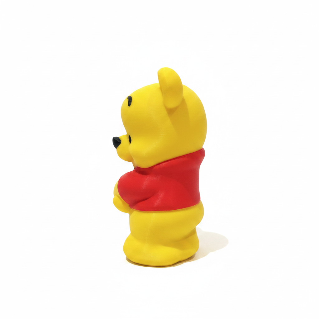 Honey Bear Buddy 3D-printed yellow bear figurine side back view, white background